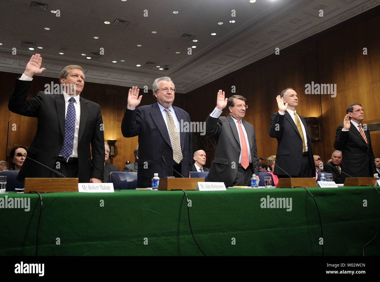 From left to right, Robert Malone, chairman and president of BP America Inc., John Hofmeister, president of Shell Oil Company, Peter Robertson, vice chairman of the Chevron Corporation, John Lowe, executive vice president of ConocoPhillips, and Stephen Simon, senior vice president of the Exxon Mobil Corporation,  are sworn in prior to a Judiciary Committee hearing on the rising price of oil in Washington on May 21, 2008. (UPI Photo/Kevin Dietsch) Stock Photo