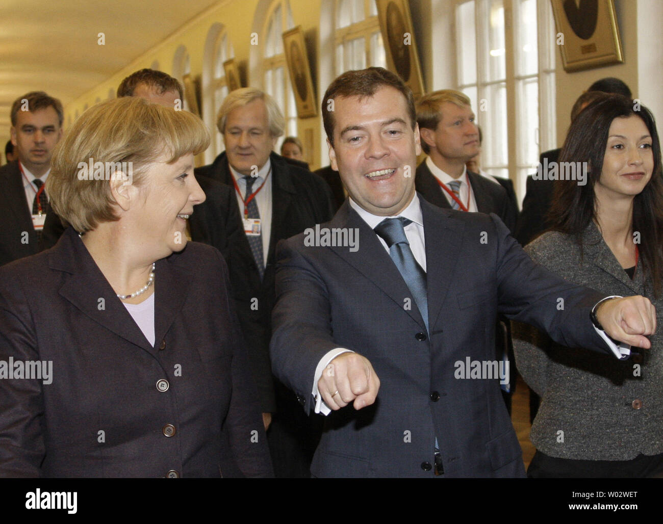 Russian President Dmitry Medvedev (R) and German Chancellor Angela Merkel walk together at St. Petersburg University on October 2, 2008. Merkel told her Russian hosts during her visit on Thursday that Georgia's territorial integrity was non-negotiable, implicitly rebuking Moscow for recognizing two Georgian regions as independent states. (UPI Photo/Anatoli Zhdanov) Stock Photo