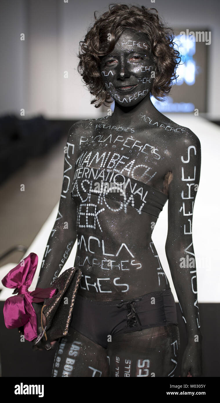 A model with body paint appears at the Miami Beach International Fashion Week in Miami Beach