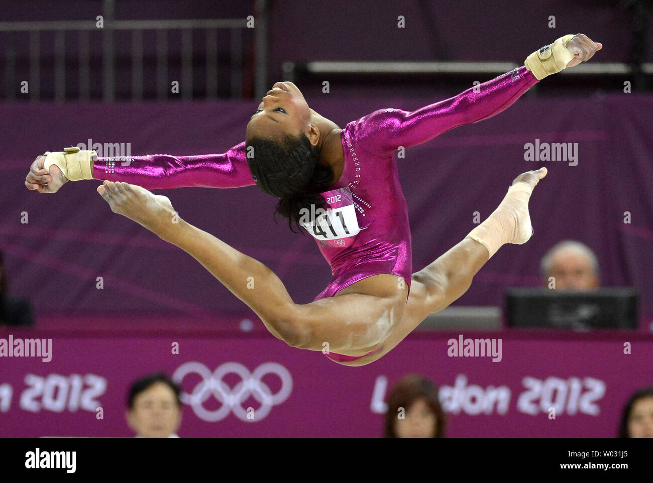 American Gymnast Gabrielle Douglas Is Airborne As She Goes Through