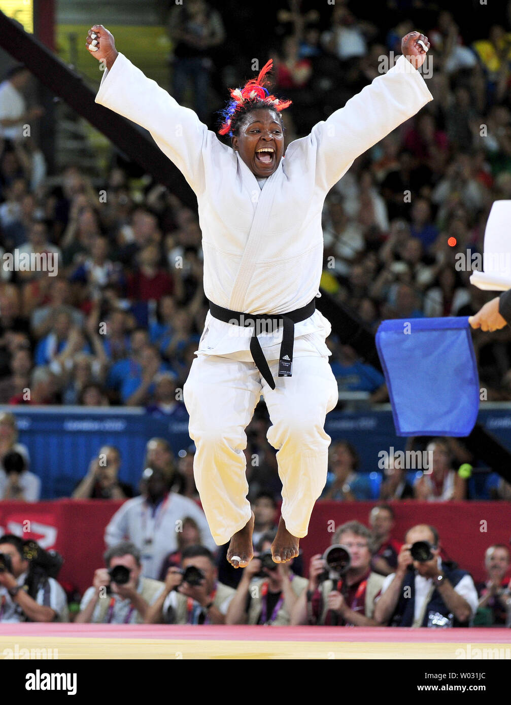 Italys Ortiz of Cuba celebrates her victory over Mika Sugimoto of Japan in the Women's 78kg Gold Medal Judo contest at the London 2012 Summer Olympics on August 3, 2012 in London. UPI/Ron Sachs Stock Photo