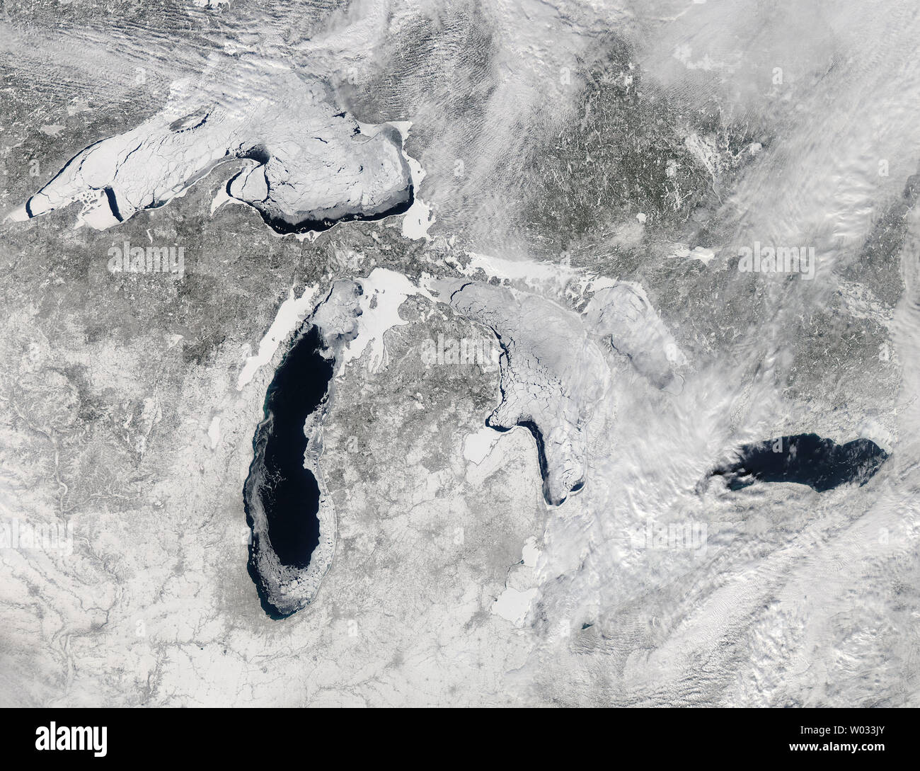 This NASA image taken on February 19, 2014 by the the Moderate Resolution Imaging Spectroradiometer (MODIS) aboard NASAÕs Aqua satellite shows the Great Lakes 80% frozen over during one of the hardest freeze-ups in four decades. North AmericaÕs Great Lakes peaked at 88.42% on February 12-13 C a percentage not recorded since 1994. The ice extent has surpassed 80% just five times in four decades. The average maximum ice extent since 1973 is just over 50%. UPI/NASA Stock Photo