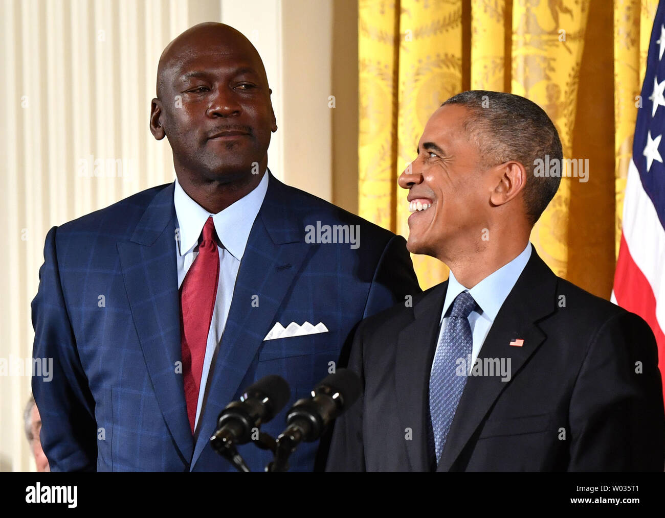 President Barack Obama awards the Presidential Medal of Freedom to  basketball legend Michael Jordan, during a ceremony at the White House in  Washington, DC, on November 22, 2016. Obama awarded 21 medals
