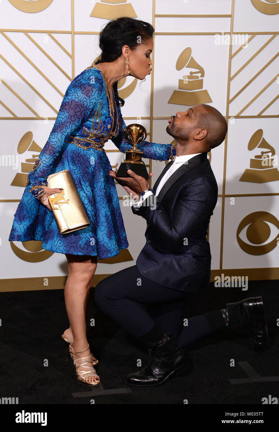 Songwriter Kirk Franklin, holding his Best Gospel Performance/Song trophy for 'Wanna Be Happy?' award, and Tammy Collins appear backstage during the 58th annual Grammy Awards held at Staples Center in Los Angeles on February 15, 2016. Photo by Phil McCarten/UPI Stock Photo