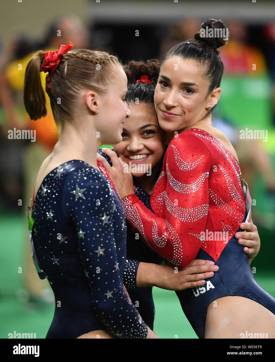 American gymnast Lauren Hernandez (C) Aly Raisman (R) and Madison ...