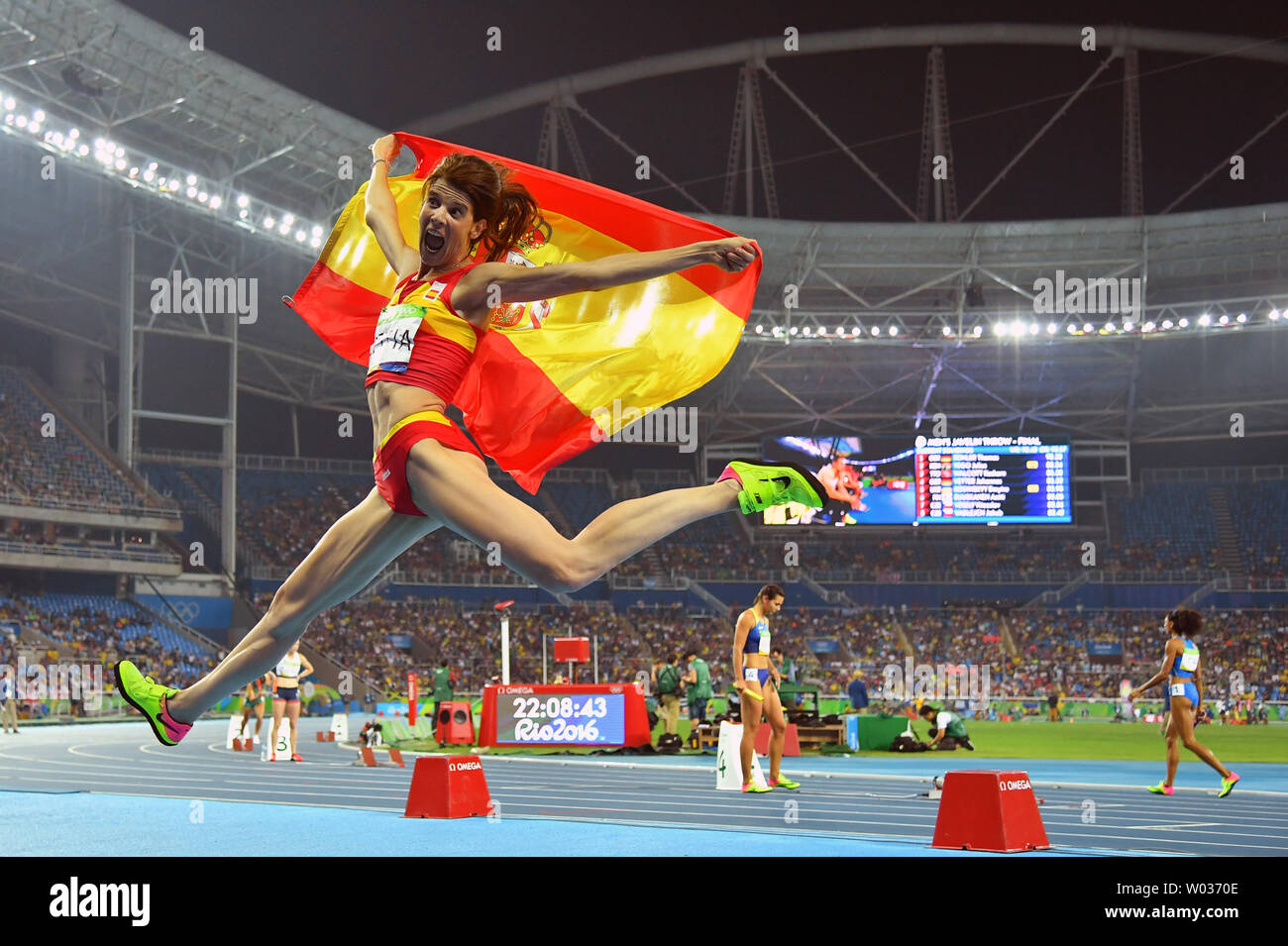 Ruth Beitia of Spain leaps in the air after winning gold in the Women's High Jump Final at Olympic Stadium at the 2016 Rio Summer Olympics in Rio de Janeiro, Brazil, on August 20, 2016. Photo by Kevin Dietsch/UPI Stock Photo