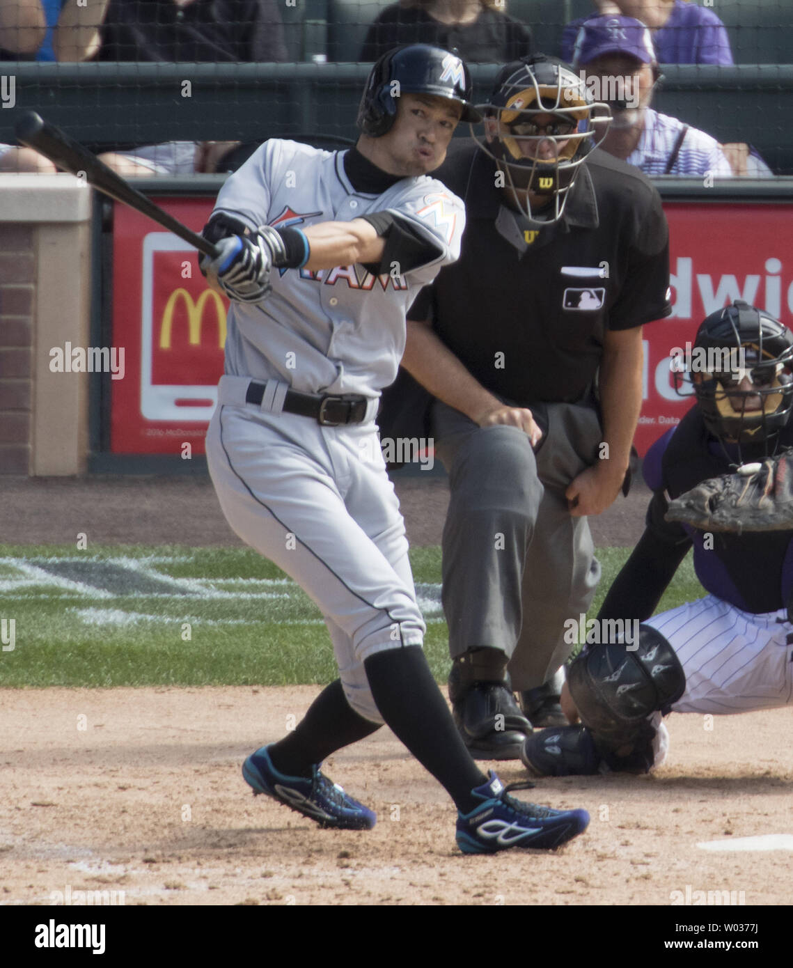 Miami Marlins outfielder Ichiro Suzuki hits a triple in the seventh inning to notch his 3,000 career hit at Coors Field in Denver on August 7, 2016. Ichiro becomes the 30th player in Major League history to record 3,000 hits. Photo by Gary C. Caskey/UPI Stock Photo