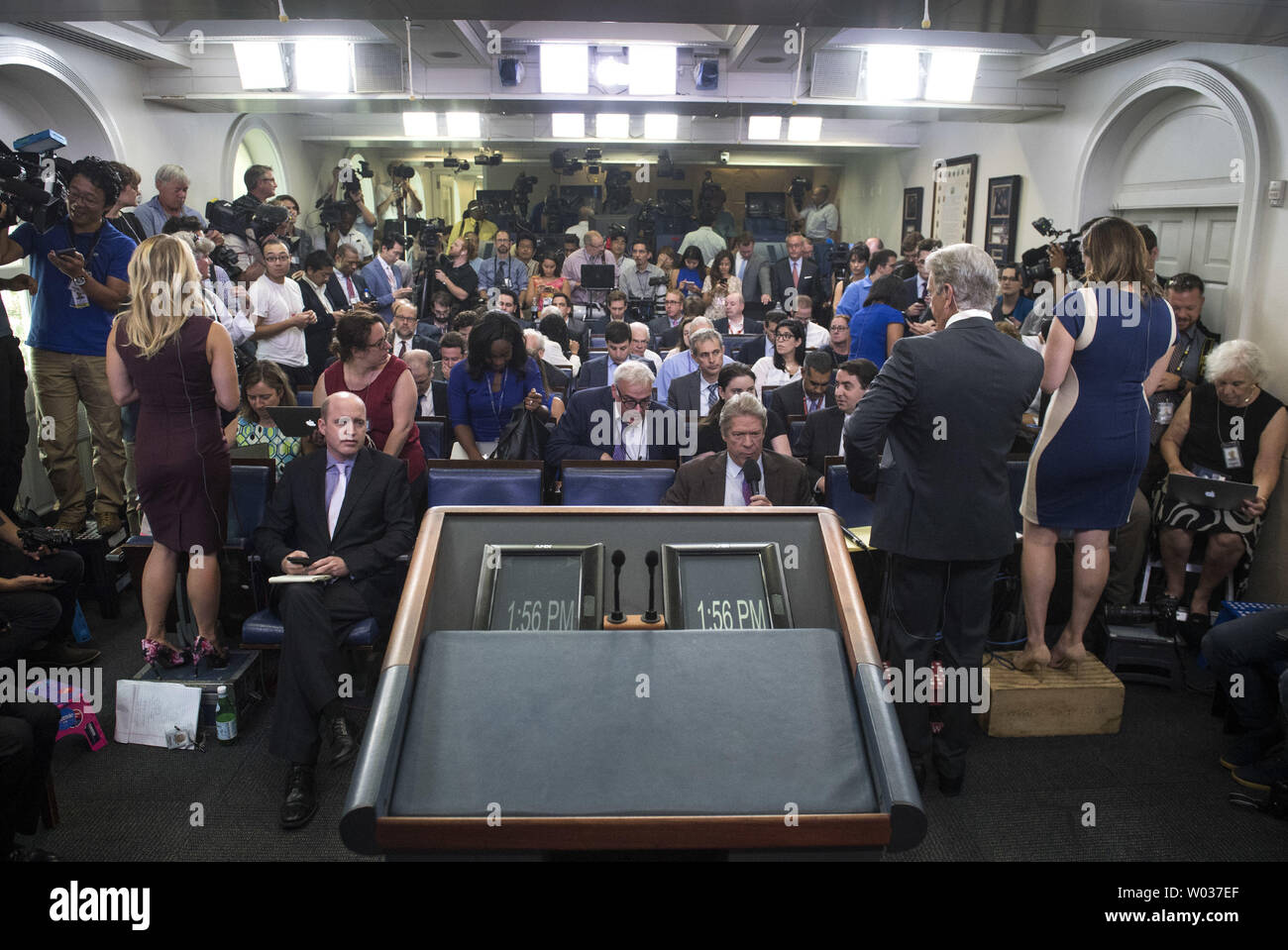 Members of the press fill the James S. Brady Press Briefing Room ...