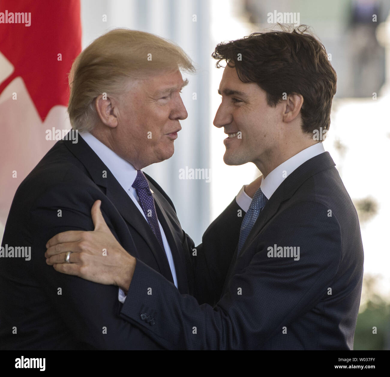 U.S. President Donald Trump greets Canada's Prime Minister Justin Trudeau on a windy day to the West Wing of the White House in Washington D.C. on February 13, 2017. The two leaders will have meetings and a press conference later in the day. Photo by Pat Benic/UPI Stock Photo