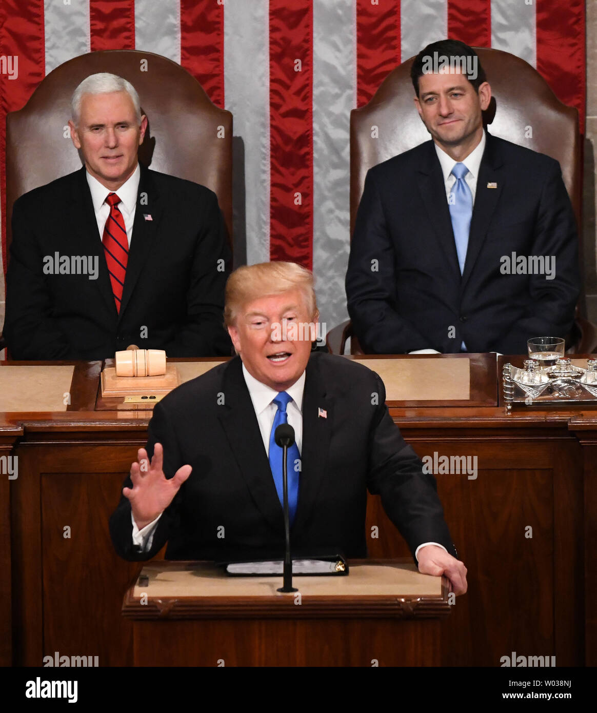 President Donald Trump delivers his State of the Union address to a joint session of Congress in the House Chamber at the U.S. Capitol in Washington, D.C., on January 30, 2018. Vice President Mike Pence and Speaker of the House Paul Ryan listen behind him.  Photo by Pat Benic/UPI Stock Photo