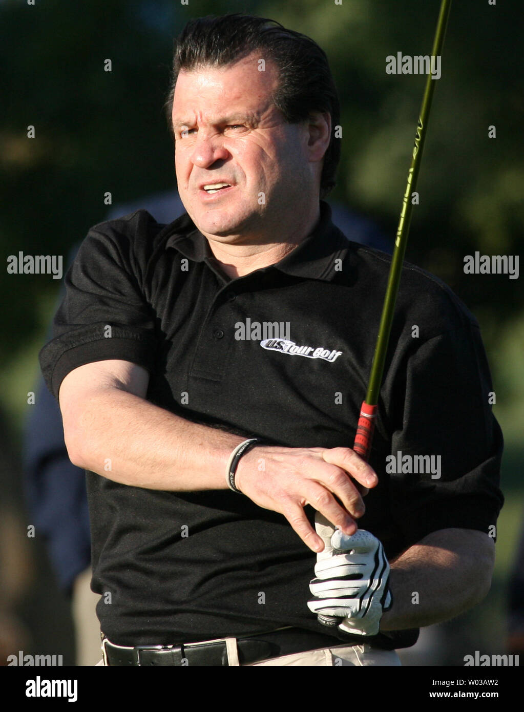Hockey player and captain of the USA gold medal team of 1980 Mike Eruzione watches his tee shot during the first round of play of the Bob Hope Chrysler Classic at Bermuda Dunes Country Club in Bermuda Dunes, California on January 17, 2007.   (UPI Photo/Art Foxall) Stock Photo