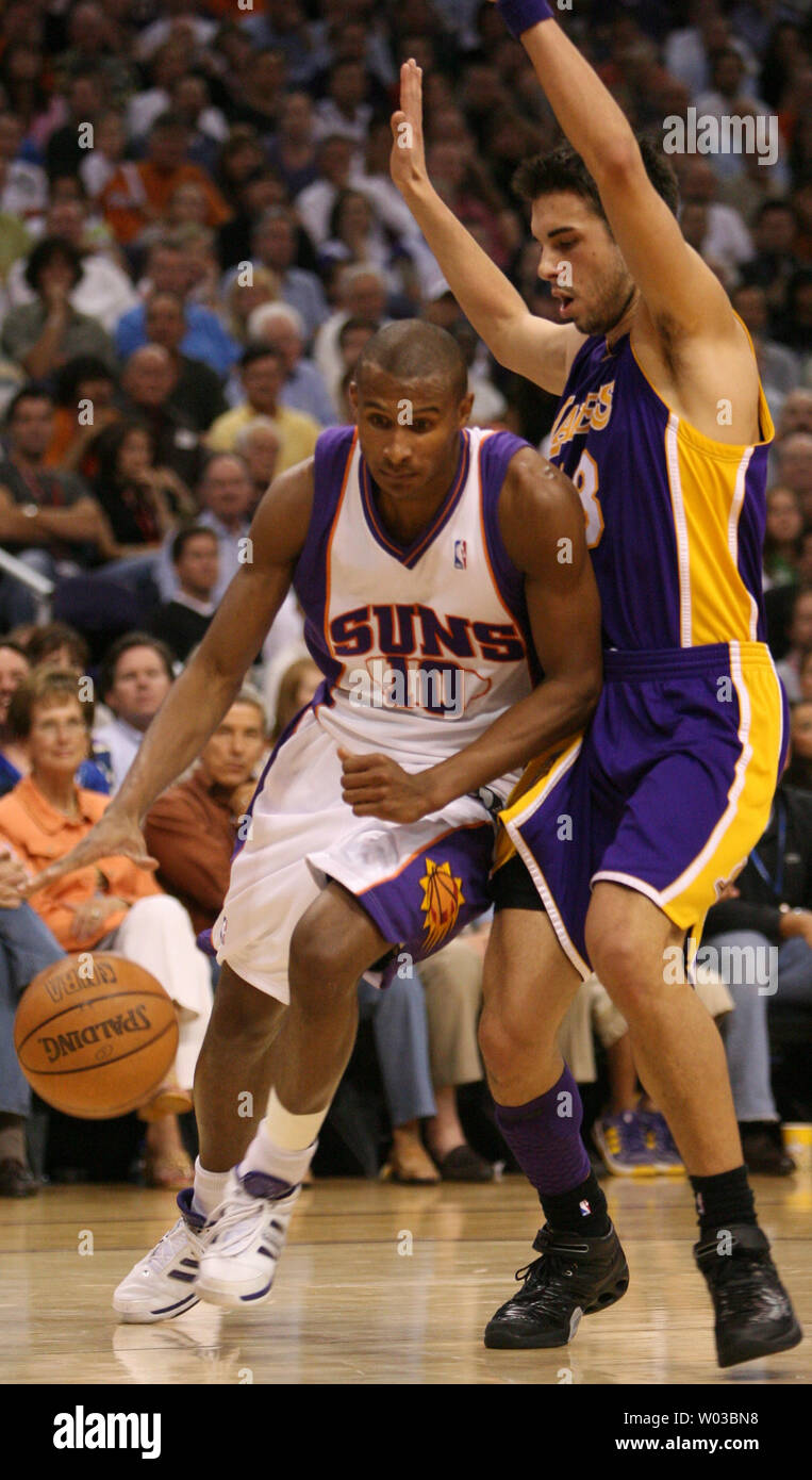 Phoenix Suns guard Leandro Barbosa (10) drives against Los Angeles Lakers Sasha Vujacic (R) of Slovenia during second half action at US Airways Center in Phoenix, Arizona on April 13, 2007.  The Suns defeated the Lakers 93-85. (UPI Photo/Art Foxall) Stock Photo