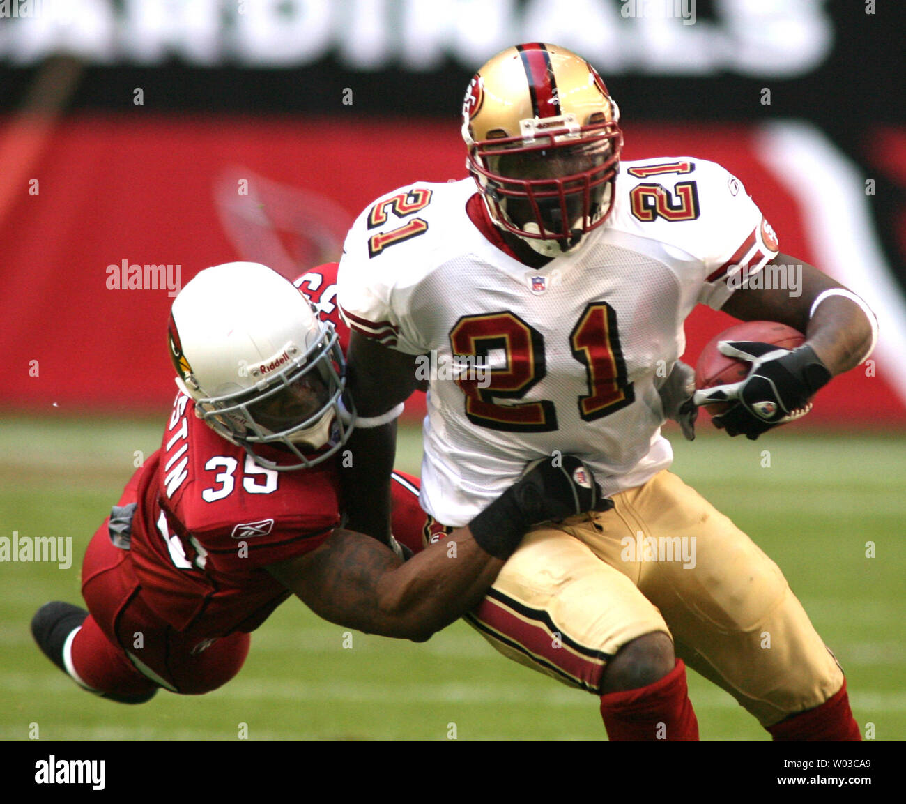 San Francisco 49ers Running Back Frank Gore (21) Is Tackled By 