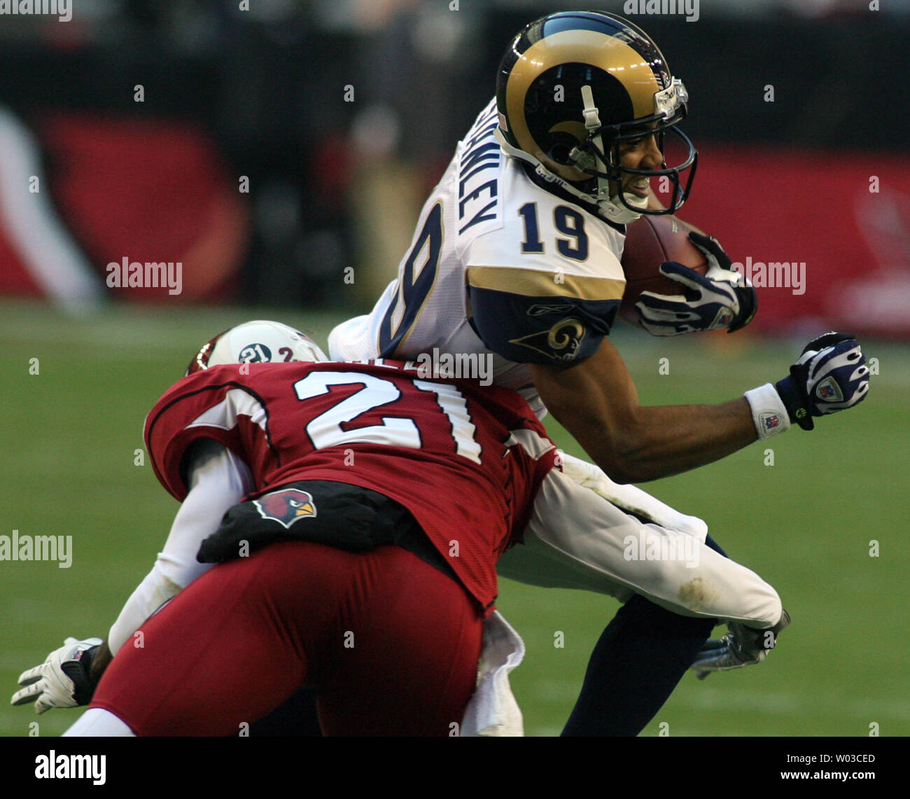 St. Louis Rams wide receiver Derek Stanley (19) runs for yardage in the first half as the Arizona Cardinals Antrel Rolle (21) tries to make the tackle at University of Phoenix Stadium in Glendale, Arizona December 30, 2007. (UPI Photo/Art Foxall) Stock Photo