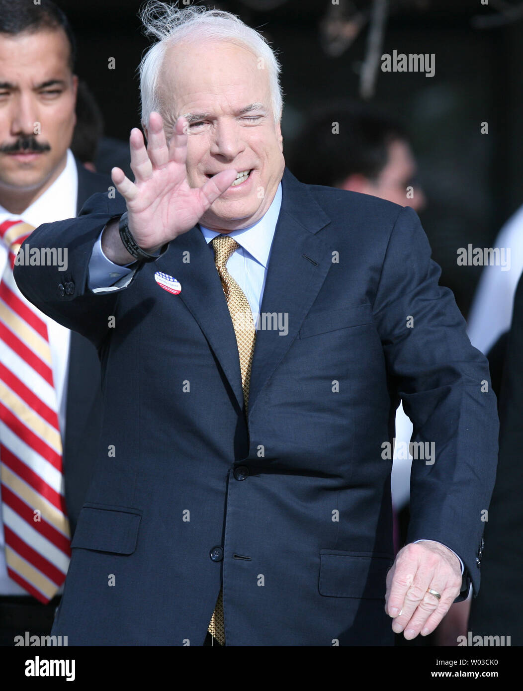 Republican presidential candidate Sen. John McCain (R-AZ) waves as he exits his polling place after casting his vote at Albright United Methodist Church in Phoenix, Arizona on November 4,2008. (UPI Photo/Art Foxall) Stock Photo