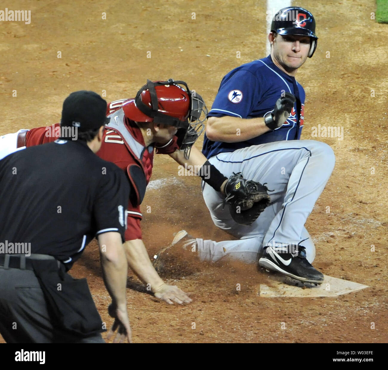 Cleveland Indians Lou Marson is safe at home as Arizona Diamondbacks catcher Miguel Montero makes a late tag in the ninth inning at Chase Field in Phoenix, AZ, June 29,2011.  The Indians defeated the Diamondbacks 6-2.  UPI/Art Foxall Stock Photo