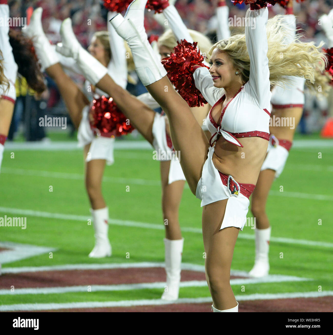 Arizona Cardinals cheerleaders perform during the second quarter of the Cardinals-Minnesota Vikings game at University of Phoenix Stadium in Glendale, Arizona, December 10, 2015. The Cardinals defeated the Vikings 23-20.  Photo by Art Foxall/UPI Stock Photo
