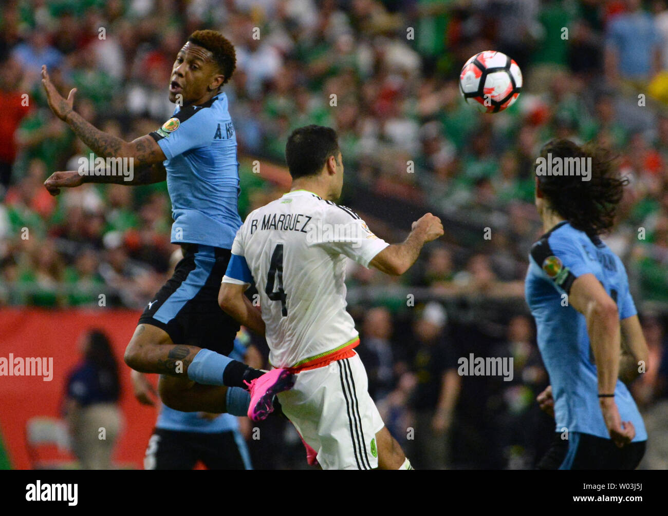 Uruguay's Abel Hernandez (L) heads the ball in the second half of the Mexico-Uruguay match during the COPA America Centenario at University of Phoenix Stadium in Glendale, Arizona, June 5,  2016. Photo by Art Foxall/UPI Stock Photo