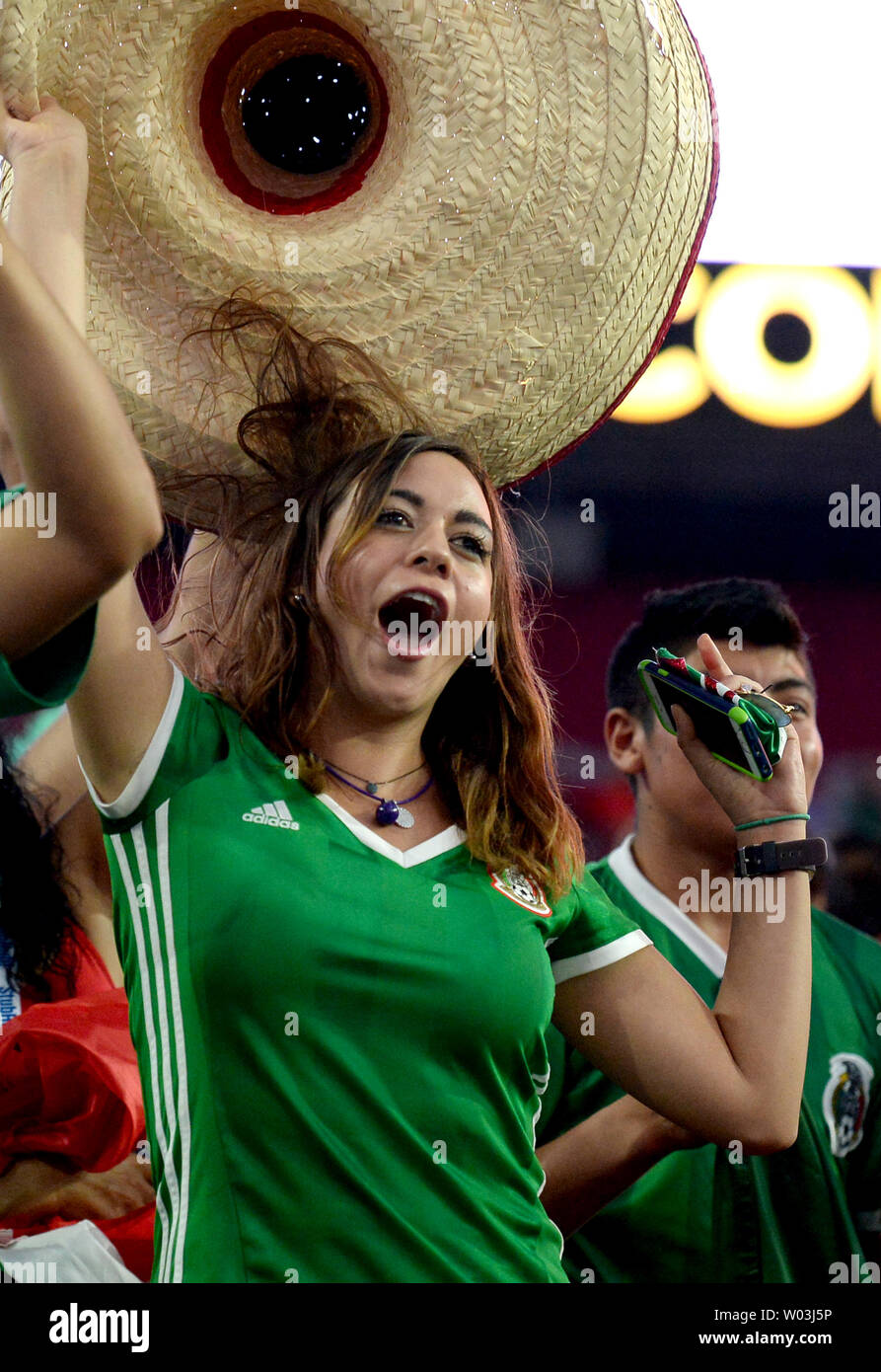 A Fan of Mexico waves a sombrero during the Mexico-Uruguay match during the  COPA America