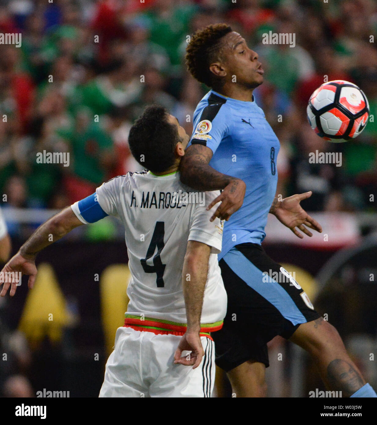 Uruguay's Abel Hernandez (R) tries to control the ball as Mexico's Rafa Marquez defense in the second half of the Mexico-Uruguay match during the COPA America Centenario at University of Phoenix Stadium in Glendale, Arizona, June 5,  2016. Photo by Art Foxall/UPI Stock Photo