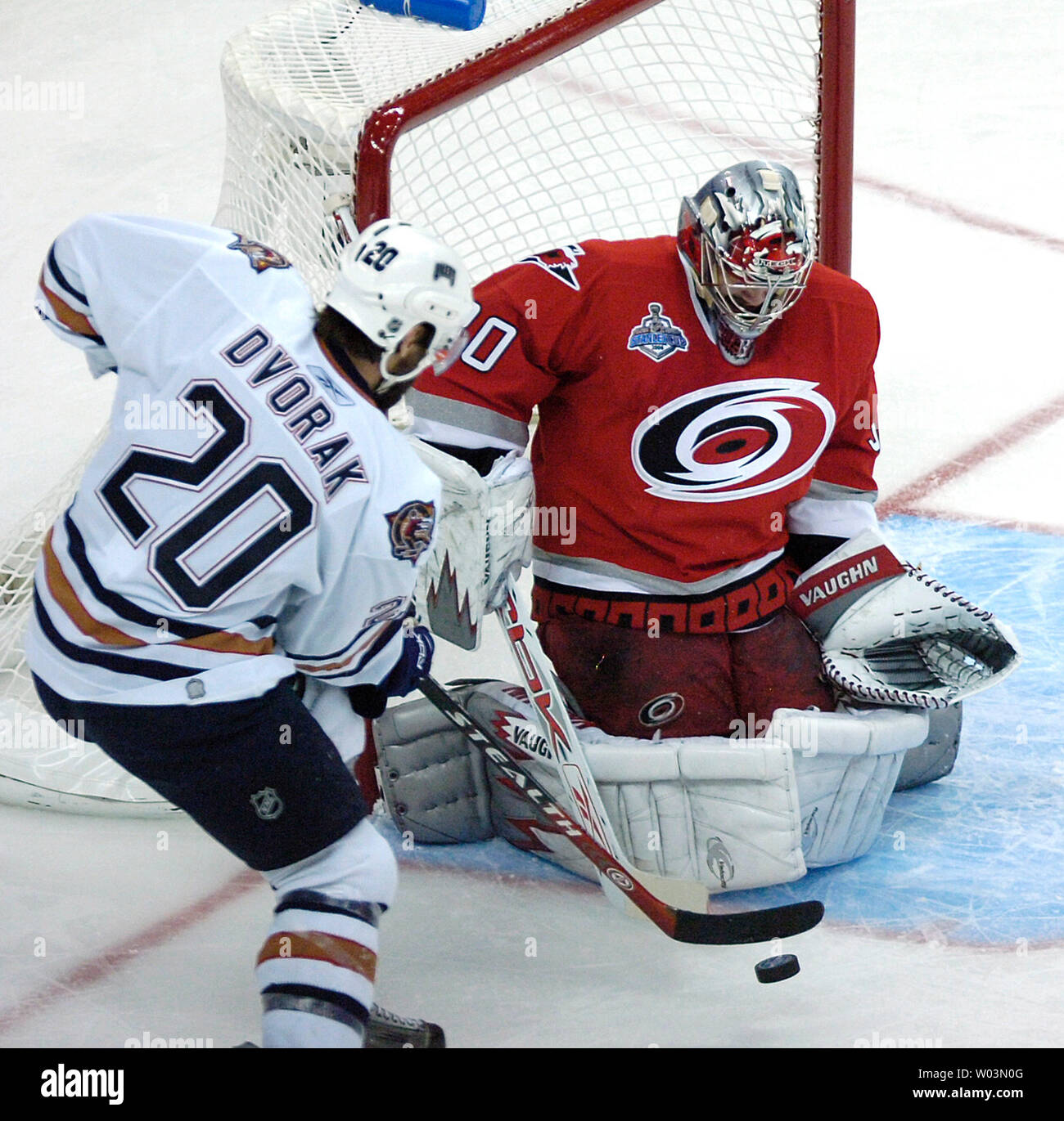 Carolina Hurricanes' Eric Staal, top, knocks Edmonton Oilers' Jarret Stoll  to the ice during Game 2 of the NHL Stanley Cup Finals at the RBC Center in  Raleigh, NC June 7, 2006. (