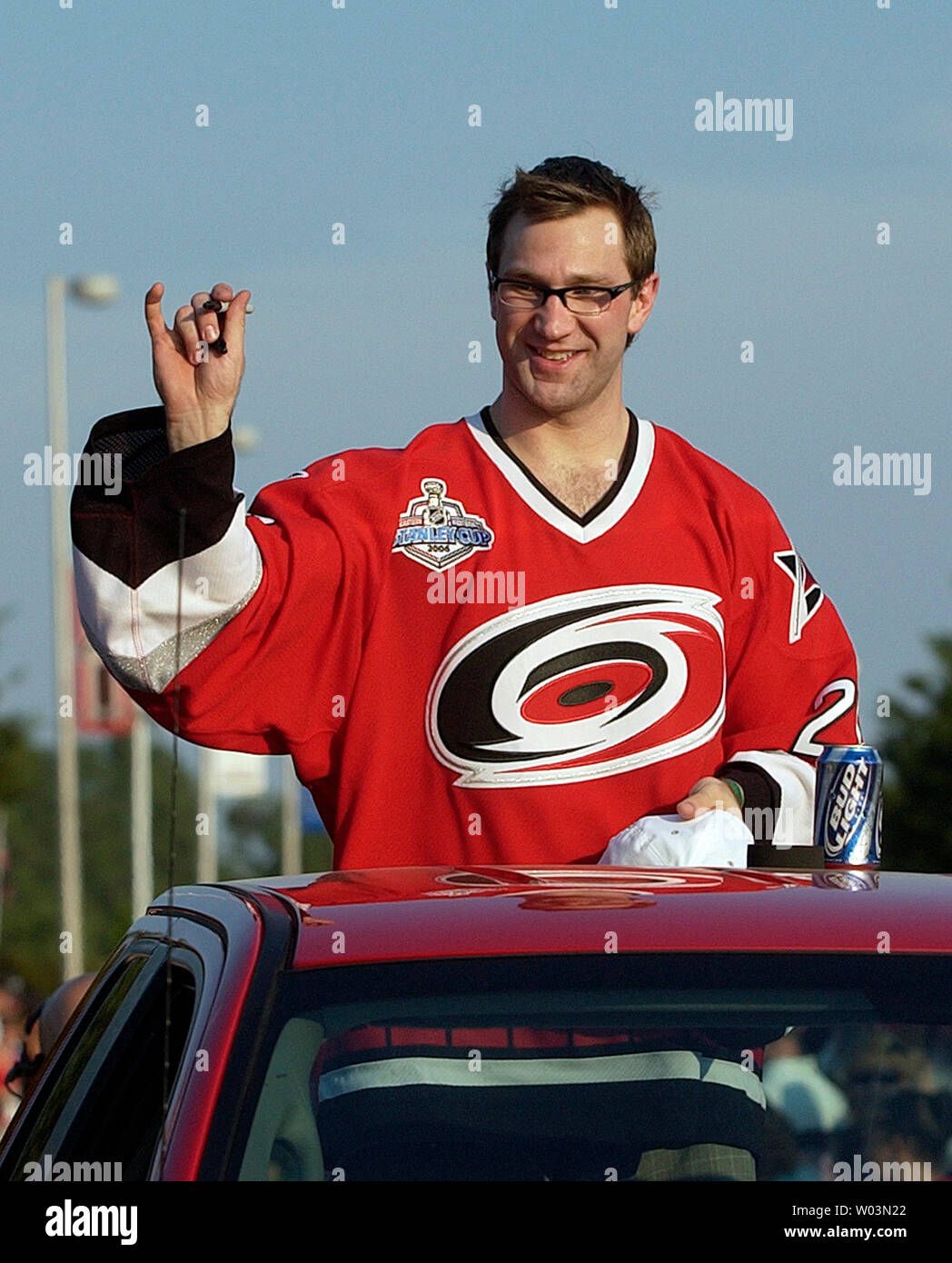 Edmonton Oilers' Erik Cole (26), a former Hurricane, flashes a smile before  first period action of an NHL game played between the Carolina Hurricanes  and the Edmonton Oilers at the RBC Center