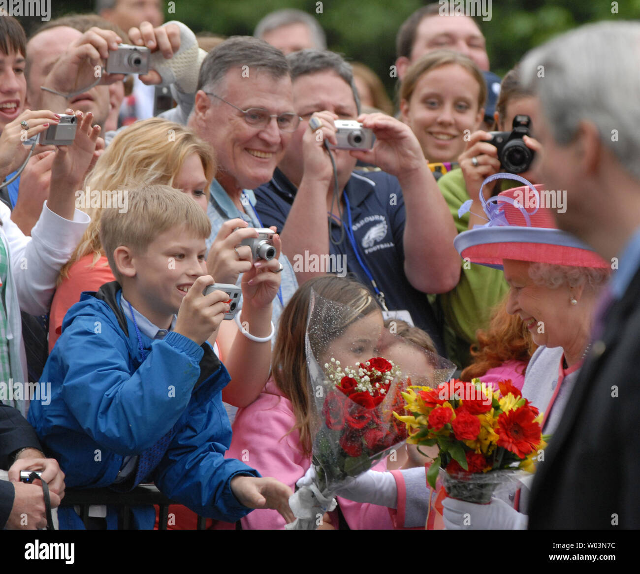 Britain's Queen Elizabeth II greets the public as she walks from the