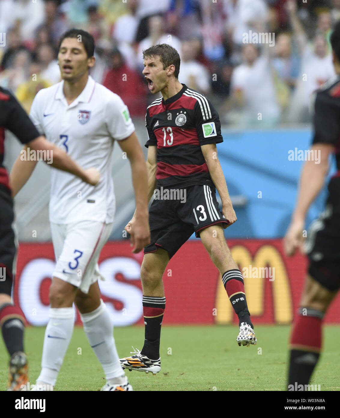 Thomas Muller of Germany celebrates scoring the opening goal during the 2014 FIFA World Cup Group G match at the Arena Pernambuco in Recife, Brazil on June 26, 2014. UPI/Chris Brunskill Stock Photo