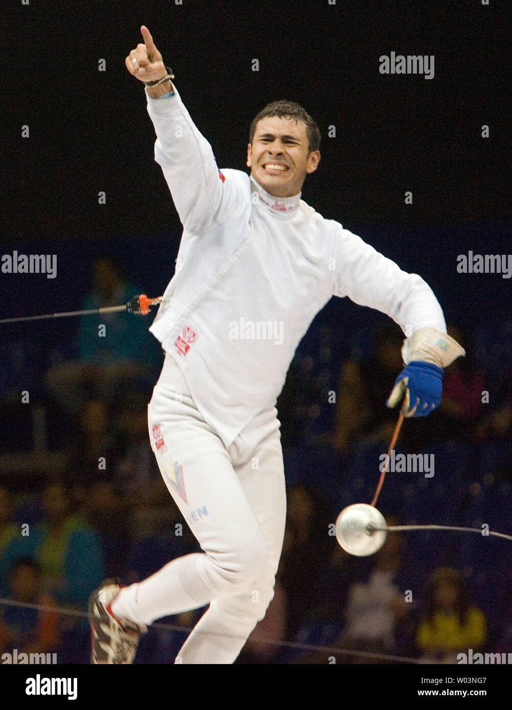 Venezuela's Reuben Limardo celebrates after beating Cuba's Andres Carrillo 11-10 in overtime, winning gold in men's individual epee at Riocentro during the 2007 Pan Am Games in Rio de Janeiro, Brazil on July 16, 2007.   (UPI Photo/Heinz Ruckemann) Stock Photo