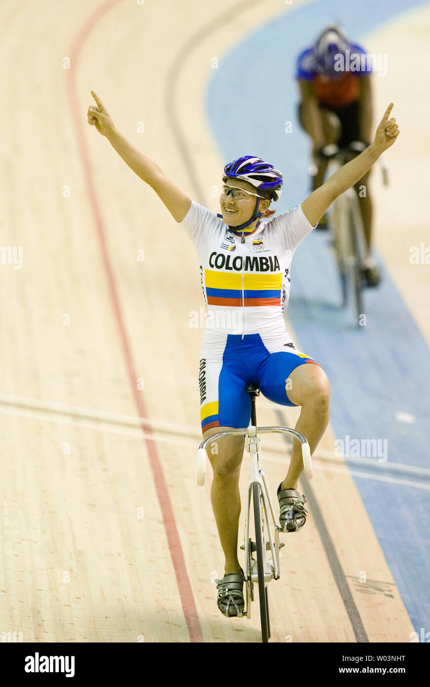 Columbia's Diana Maria Garcia Orrego celebrates winning gold in women's sprint finals of track cycling during the 2007 Pan Am Games in Rio de Janeiro, Brazil on July 18, 2007.  (UPI Photo/Heinz Ruckemann) Stock Photo
