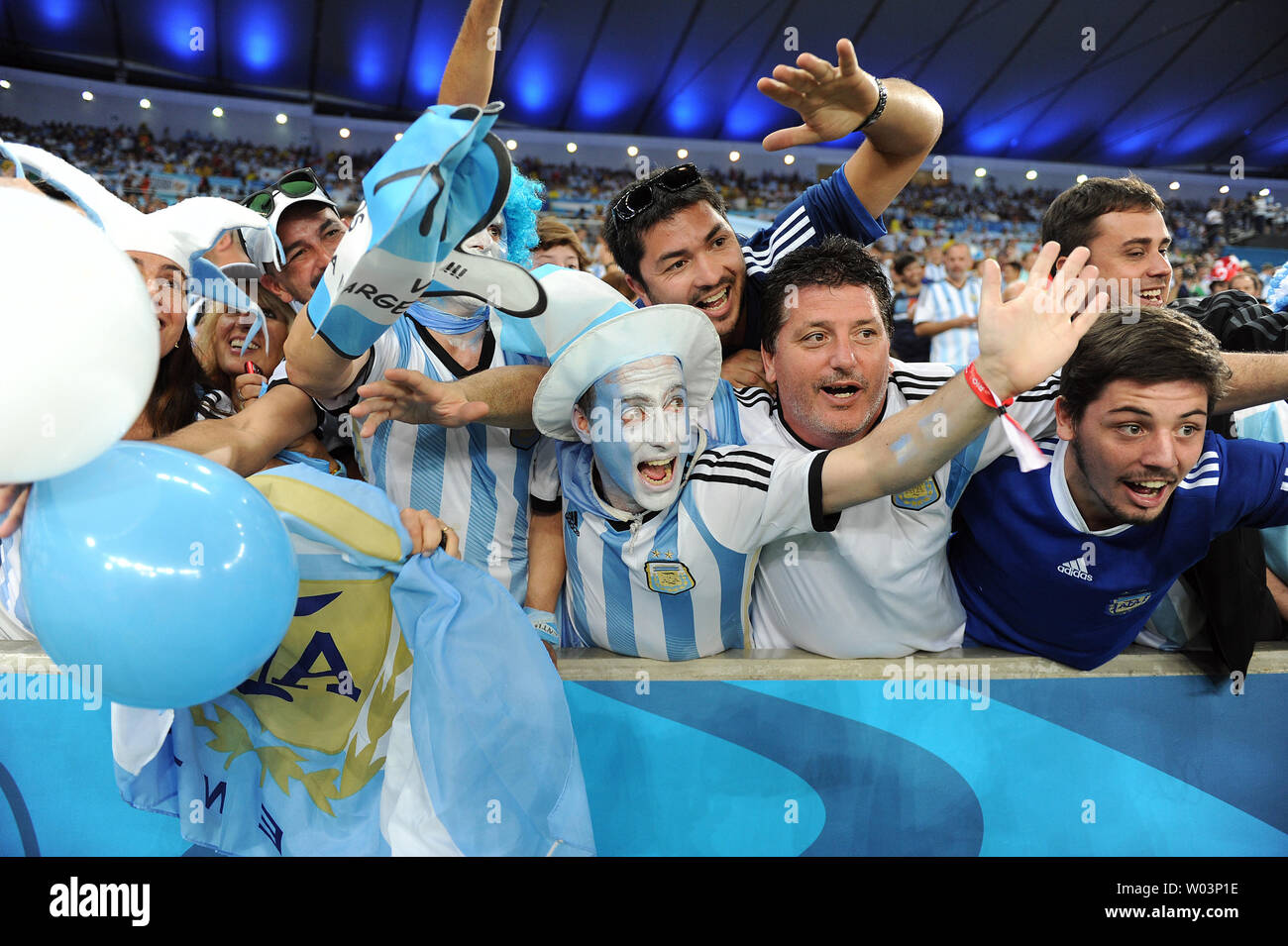 Argentina fans support their team during the 2014 FIFA World Cup Group F match at the Estadio do Maracana in Rio de Janeiro, Brazil on June 15, 2014. UPI/Chris Brunskill Stock Photo