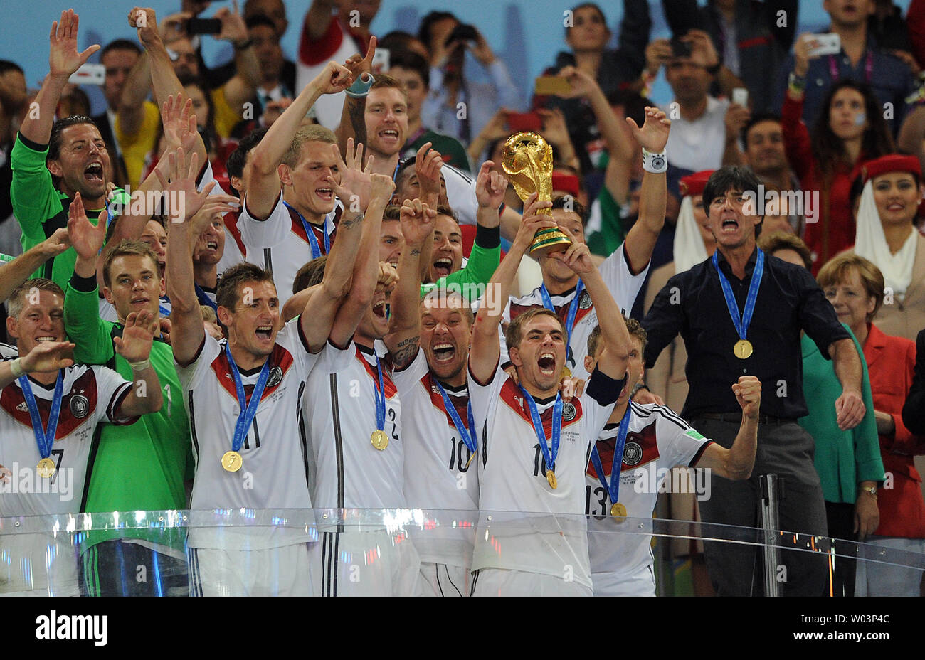 Philipp Lahm of Germany lifts the trophy following the 2014 FIFA World Cup Final at the Estadio do Maracana in Rio de Janeiro, Brazil on July 13, 2014. UPI/Chris Brunskill Stock Photo