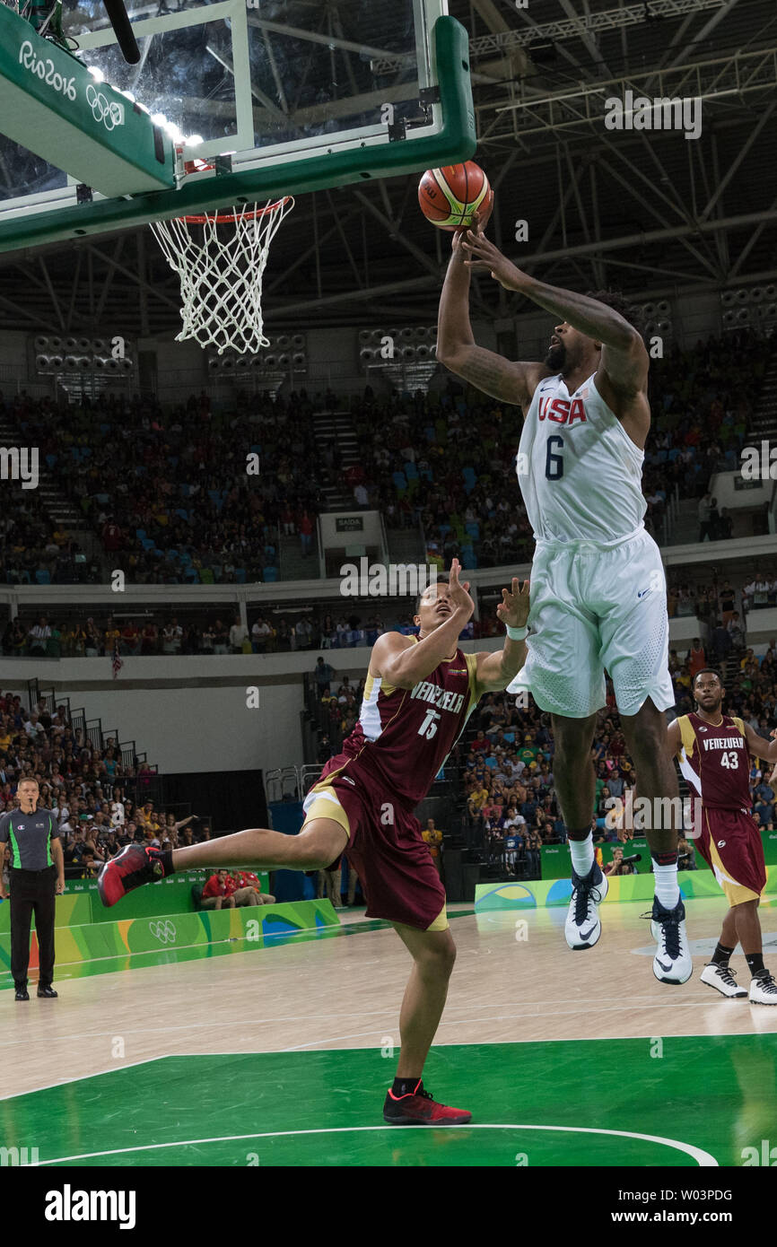 United States center DeAndre Jordan (6) comes in for the shot against Venezuela power forward Windi Graterol (15) during basketball competition at the Carioca Arena 1 in Rio de Janeiro, Brazil, August 8, 2016. The USA team overcame a slow start coasting to an easy 113-69 win over Venezuela.     Photo by Richard Ellis/UPI Stock Photo