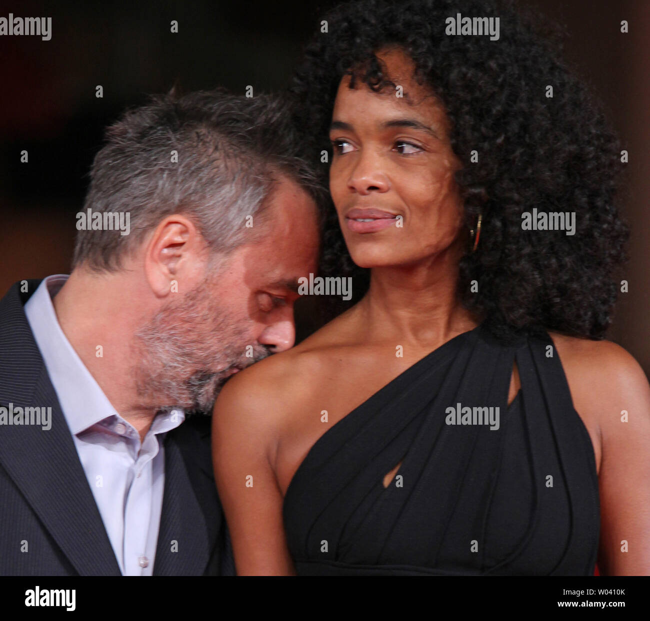 Luc Besson (L) and Virginie BessonSilla arrive on the red carpet