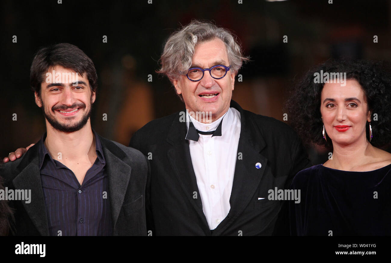 Damiano Ottavio Bigi (L), Wim Wenders (C) and Cristiana Morganti arrive on the red carpet before a screening of the film 'Pina' during the 6th Rome International Film Festival in Rome on October 31, 2011.   UPI/David Silpa Stock Photo