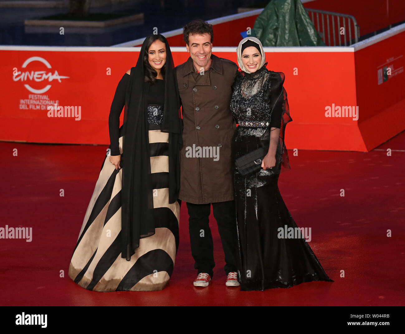 Dana Keilani L Alessio Cremonini C And Sara El Debuch Arrive On Dana Keilani L Alessio Cremonini C And Sara El Debuch Arrive On The Red Carpet Before The Screening Of The Film Border During The 8th Annual Rome Film Festival In Rome On November 12 2013 Upidavid Silpa W044RB 
