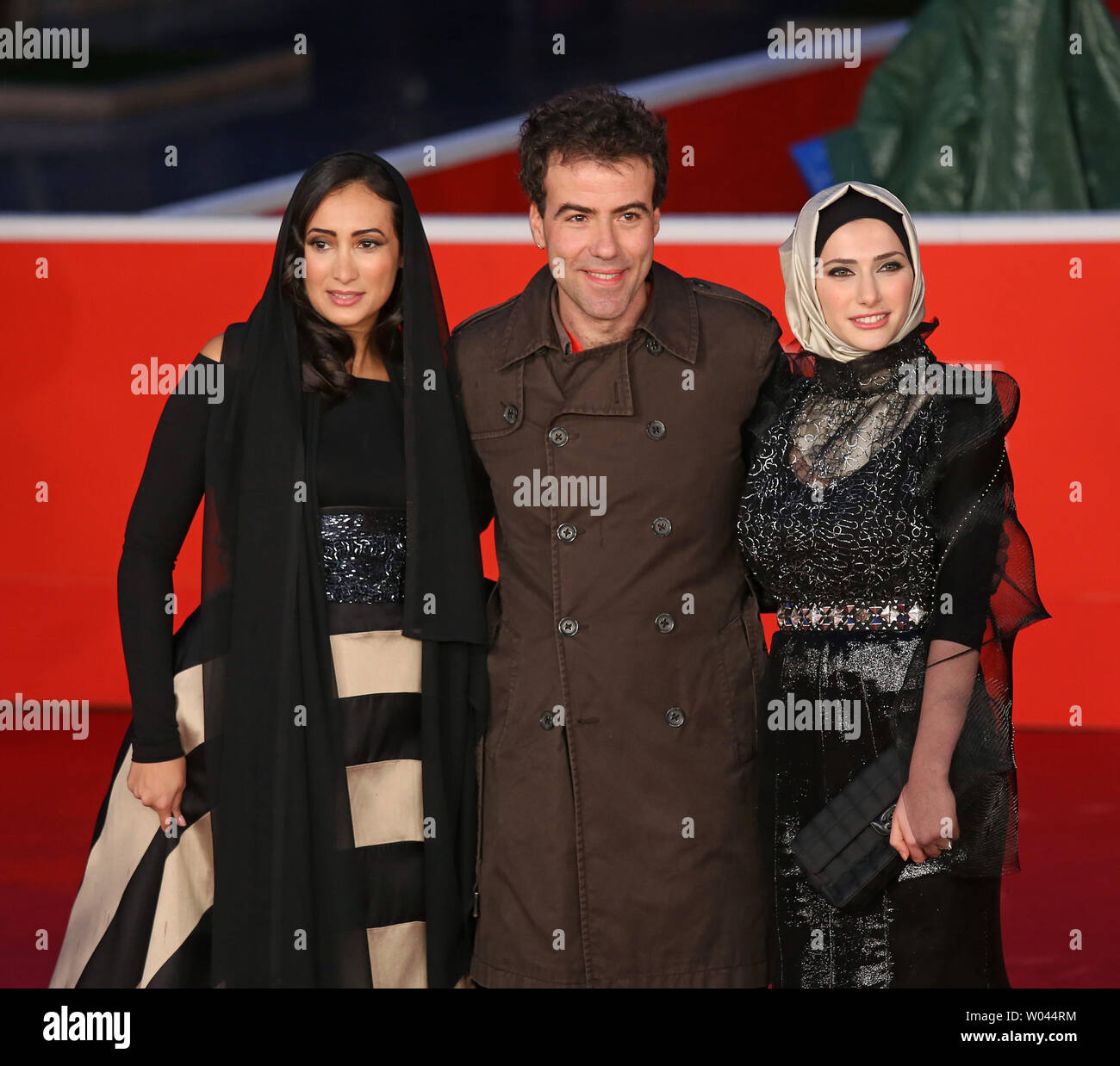 Dana Keilani L Alessio Cremonini C And Sara El Debuch Arrive On Dana Keilani L Alessio Cremonini C And Sara El Debuch Arrive On The Red Carpet Before The Screening Of The Film Border During The 8th Annual Rome Film Festival In Rome On November 12 2013 Upidavid Silpa W044RM 