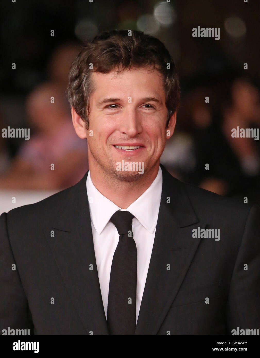 Guillaume arrives on the red carpet before the screening of the