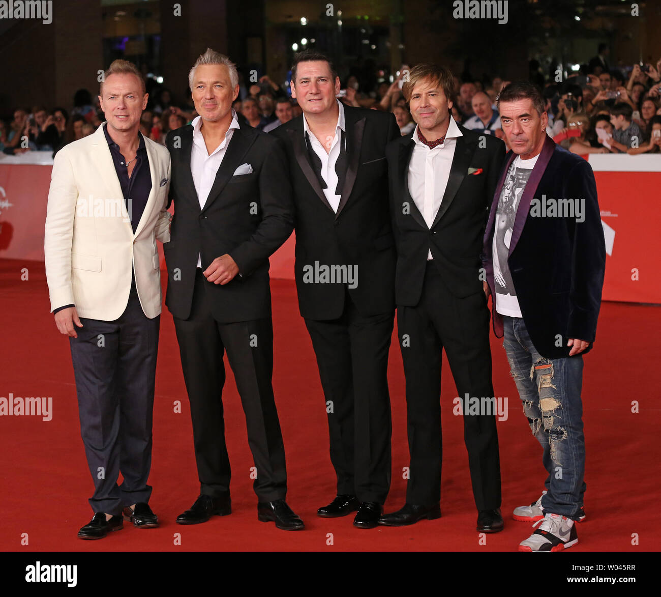 (From L to R) Gary Kemp, Martin Kemp, Steve Norman, Tony Hadley and John Keeble of Spandau Ballet arrive on the red carpet before the screening of the film 'Soul Boys of the Western World' at the 9th annual Rome International Film Festival in Rome on October 20, 2014.   UPI/David Silpa Stock Photo