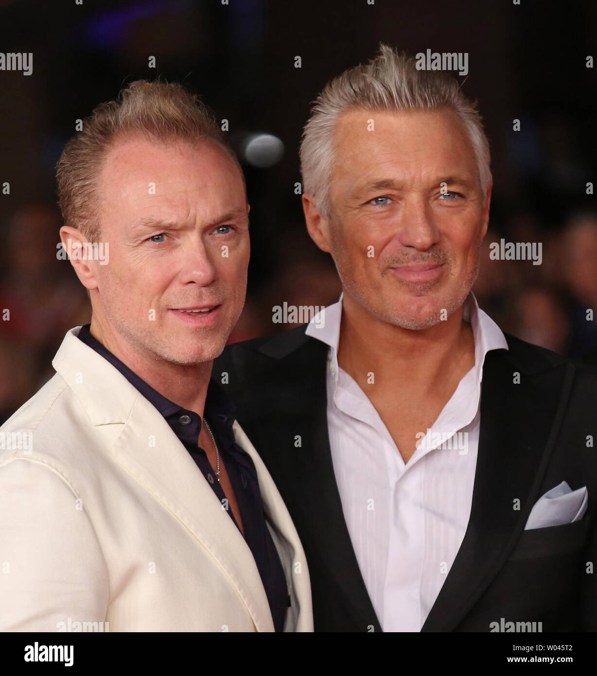 Gary Kemp (L) and Martin Kemp of Spandau Ballet arrive on the red carpet  before the screening of the film "Soul Boys of the Western World" at the  9th annual Rome International