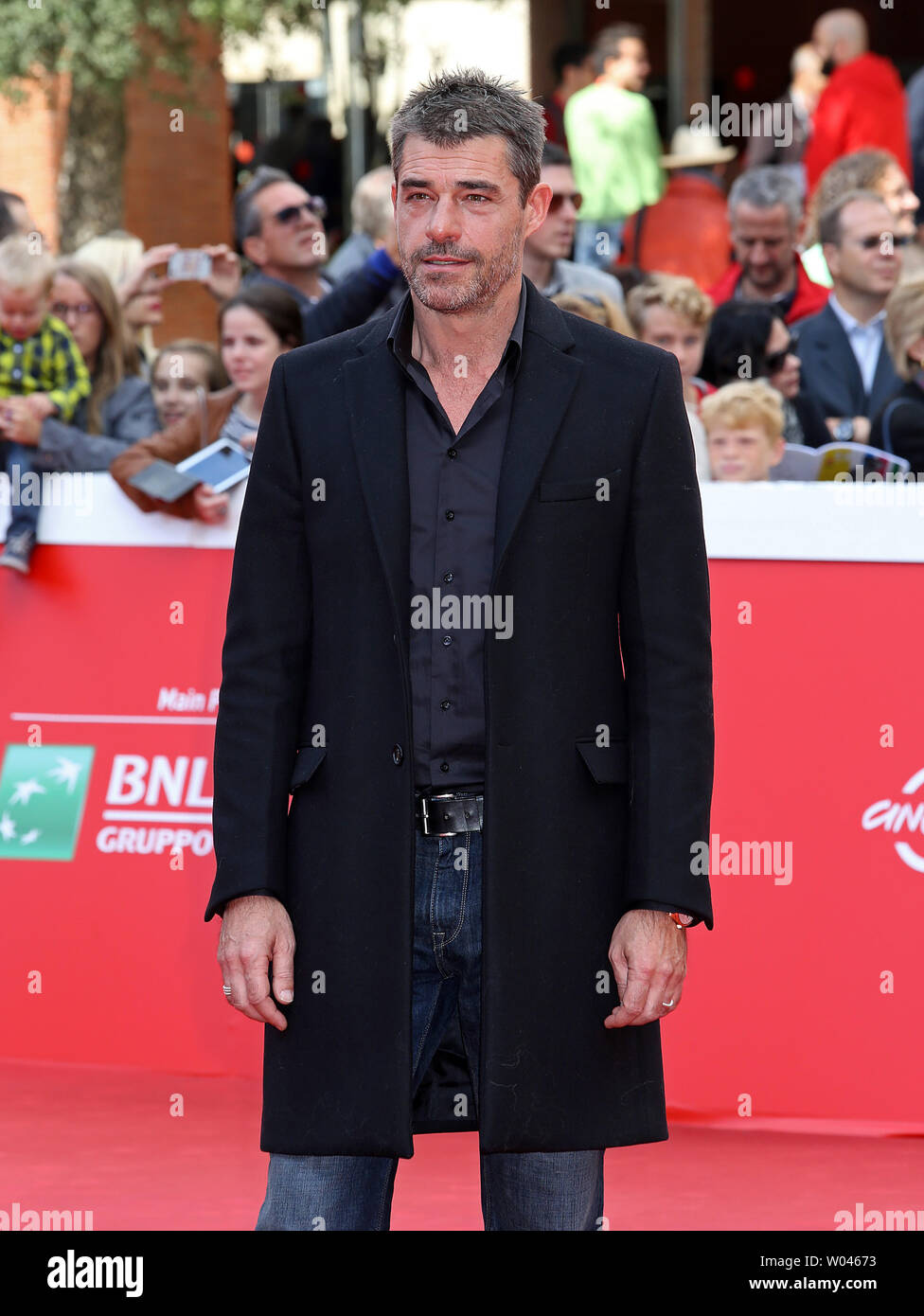 Thierry Neuvic arrives on the red carpet before the screening of the film 'Belle et Sebastien, l'aventure continue' at the 10th annual Rome International Film Festival in Rome on October 17, 2015.   UPI/David Silpa Stock Photo