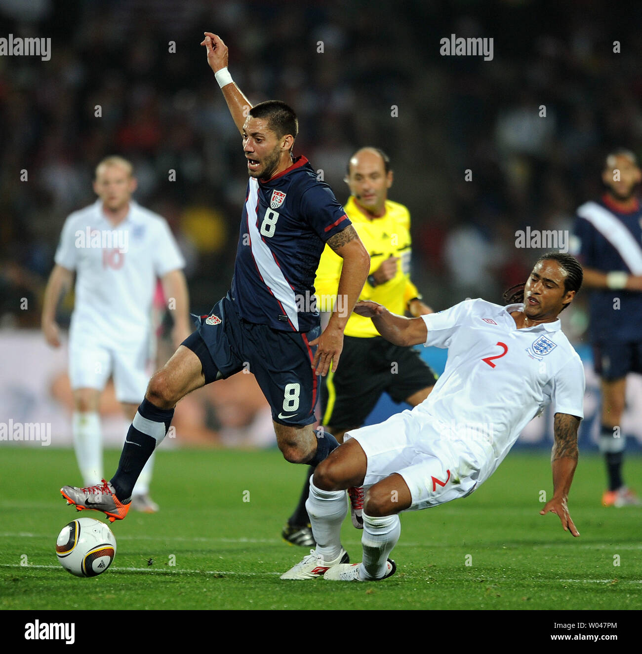 Glen Johnson of England battles with Clint Dempsey of USA during the Group B match at the Royal Bafokeng Stadium in Rustenburg, South Africa on June 12, 2010. UPI/Chris Brunskill Stock Photo