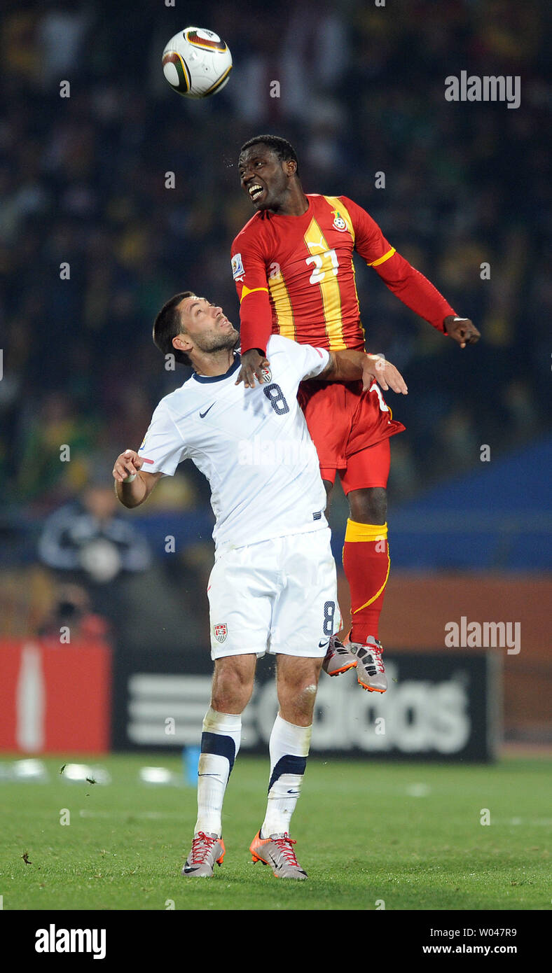 Clint Dempsey of USA and Kwadwo Asamoah of Ghana head the ball during the Round 16 match at the Royal Bafokeng Stadium in Rustenburg, South Africa on June 26, 2010. UPI/Chris Brunskill Stock Photo