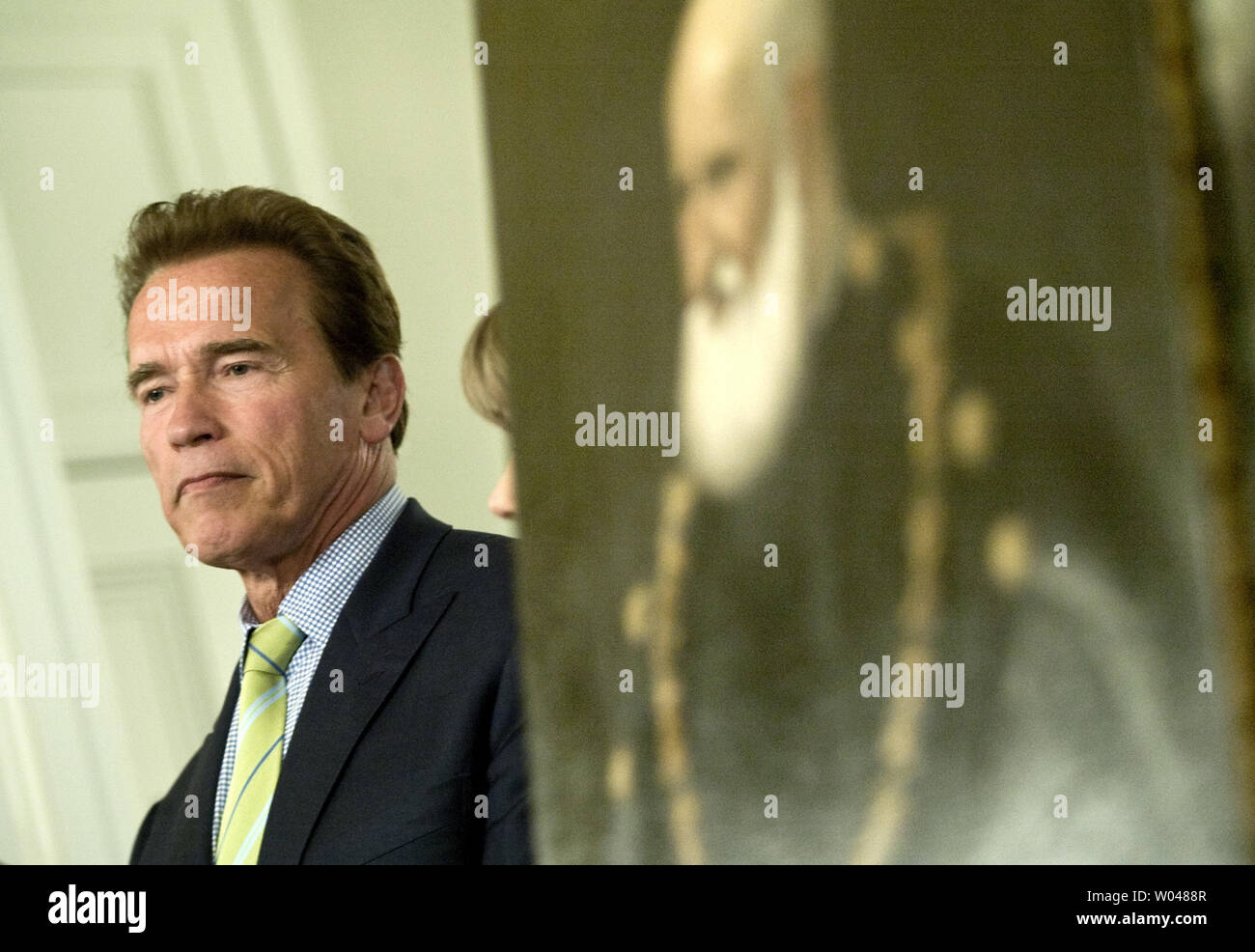 Governor Arnold Schwarzenegger attends a ceremony at the Leland Stanford Mansion in Sacramento, California, to return three paintings, confiscated by the Nazis during the time of the Holocaust, to the heirs of Jakob and Rosa Oppenheimer on April 10, 2009.  (UPI Photo/Ken James) Stock Photo