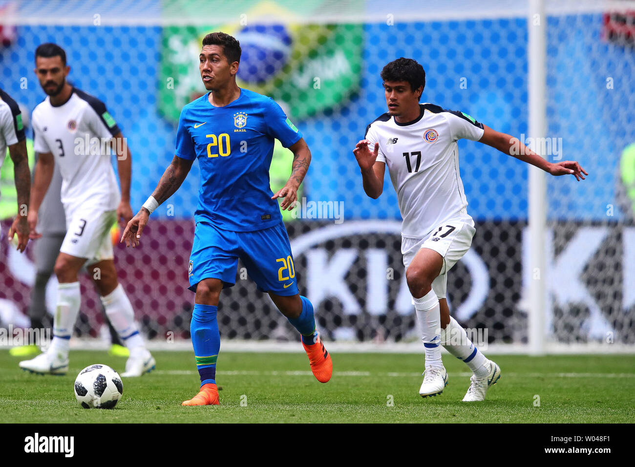 Roberto Firmino (L) of Brazil in action with Yeltsin Tejeda of Costa Rica during the 2018 FIFA World Cup Group E match at the Saint Petersburg Stadium in Saint Petersburg, Russia on June 22, 2018. Photo by Chris Brunskill/UPI Stock Photo