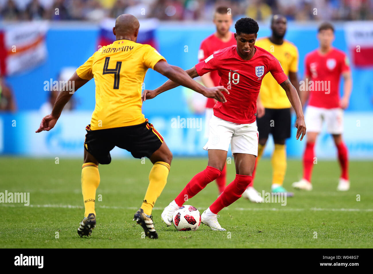 Vincent Kompany (L) of Belgium competes for the ball with Marcus Rashford of England during the 2018 FIFA World Cup third place play-off match at the Saint Petersburg Stadium in Saint Petersburg, Russia on July 14, 2018. Belgium beat England 2-0 to finish third. Photo by Chris Brunskill/UPI Stock Photo