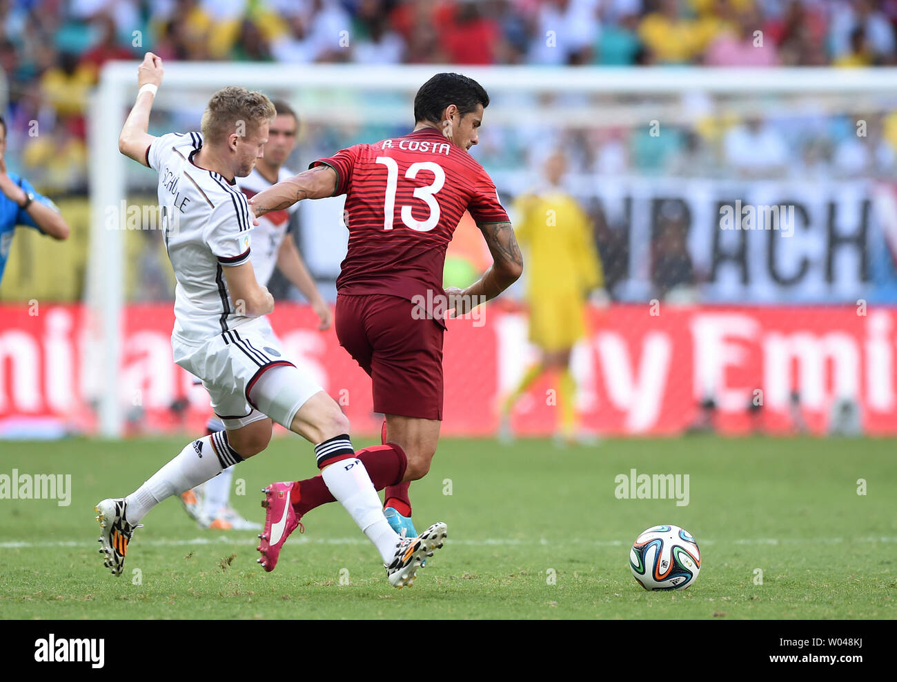 Andre Schurrle of Germany competes with Ricardo Costa of Portugal during the 2014 FIFA World Cup Group G match at the Arena Fonte Nova in Salvador, Brazil on June 16, 2014. UPI/Chris Brunskill Stock Photo