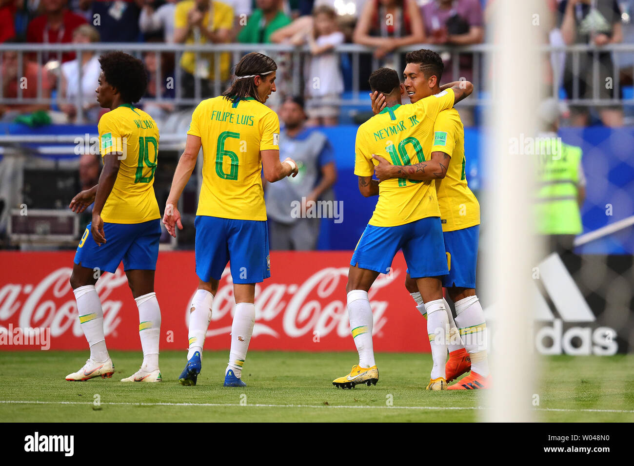 Roberto Firmino (R) of Brazil is congratulated by team-mate Neymar after scoring his side's second goal during the 2018 FIFA World Cup Round of 16 match at Samara Arena in Samara, Russia on July 2, 2018. Brazil beat Mexico 2-0 to qualify for the quarter-finals. Photo by Chris Brunskill/UPI Stock Photo