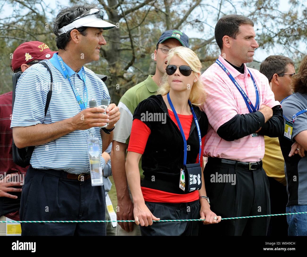 Tiger Woods' wife Elin Nordegren (C) watches Woods as he hits down the 12th fairway during the playoff round at the U.S. Open at Torrey Pines Golf Course in San Diego on June 16, 2008. Woods won the 108th U.S. Open defeating Rocco Mediate by one stroke on a sudden death playoff hole during a playoff round. (UPI Photo/Kevin Dietsch) Stock Photo