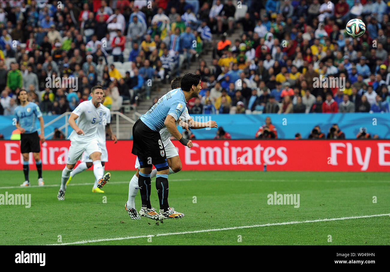 Luis Suarez of Uruguay heads the opening goal during the 2014 FIFA World Cup Group D match at the Arena Corinthians in Sao Paulo, Brazil on June 19, 2014. UPI/Chris Brunskill Stock Photo